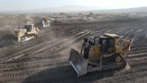 Five Caterpillar D9T And Komatsu D275 Bulldozers In Action - Aerial View