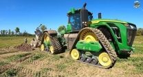 John Deere 9RX 770 Tractor pulling a Tile Plow in Indiana