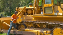 Fixing Frozen Track Links on a Bulldozer