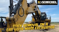 Removing the stick on a CAT 6015B Mass Excavator. 