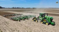 John Deere 9RX 640 Tractor working ground ahead of the Corn Planter