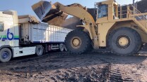 Caterpillar 990 Wheel Loader Loading Coal On Lorries
